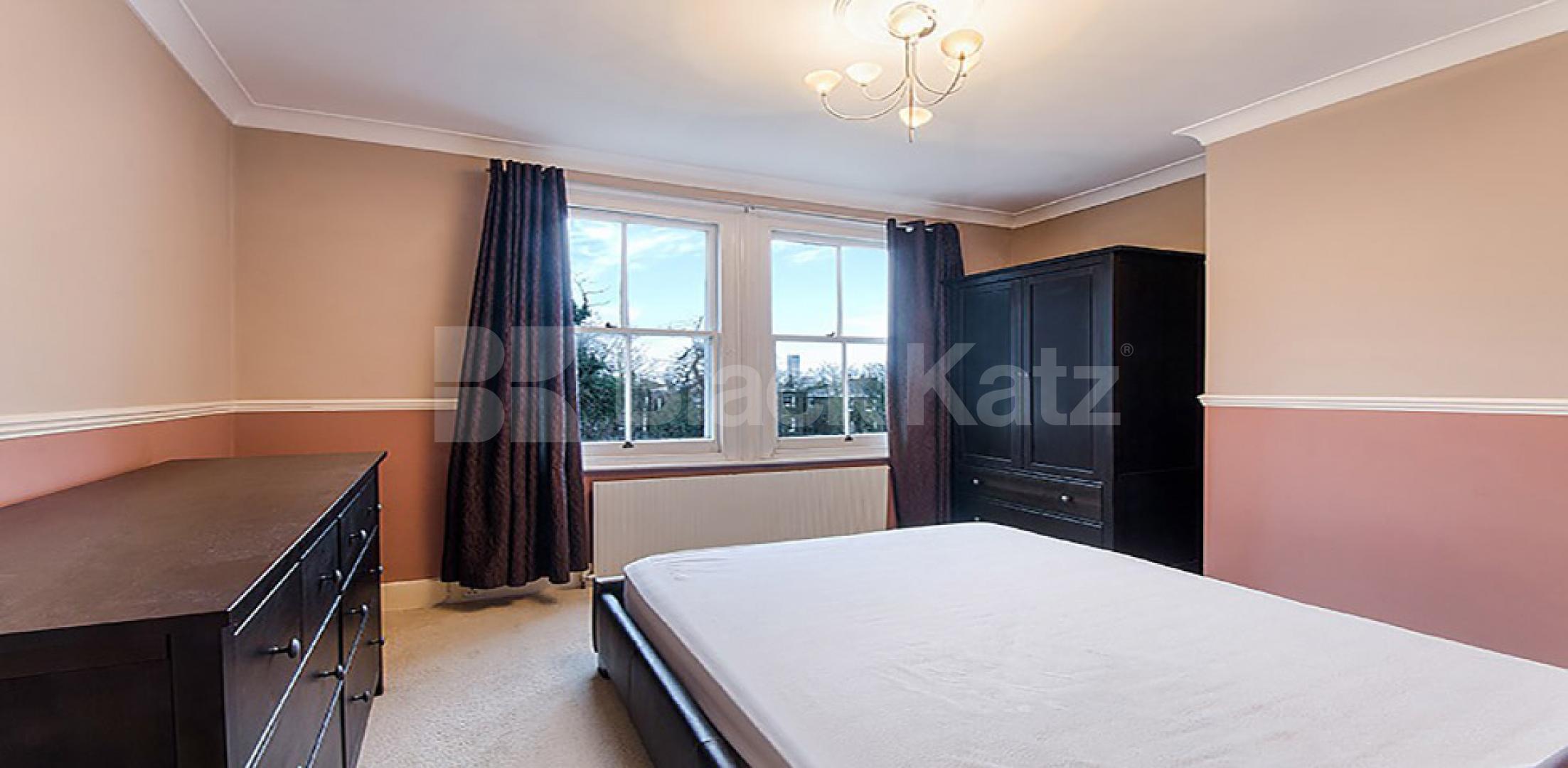 Two bedroom flat set within a period house in Camden South Villas, Camden Square